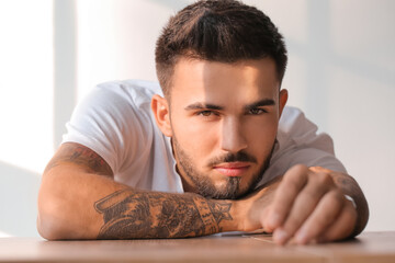 Fashionable young man on white background