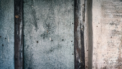 rough texture on old wall with wood and iron