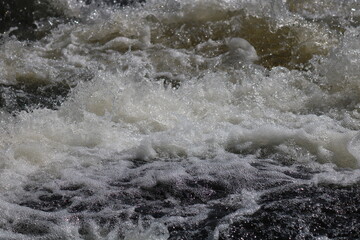 water flowing into the river