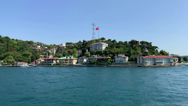 Footage of Anadolu hisari / Kandilli area of Istanbul by Bosphorus. Beautiful scene. It is a sunny summer day. Camera moves forward.