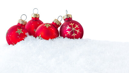Christmas greeting card with Christmas Decorations, snow and red Balls isolated on white background.