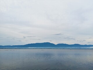 Dramatic blue sky with lake