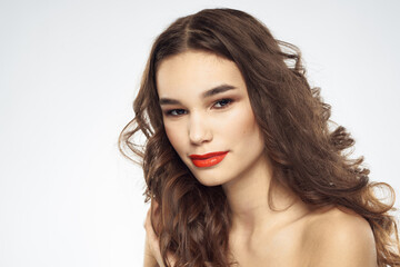 Fototapeta premium Elegant woman with bare shoulders red lips glamor attractive look cropped look