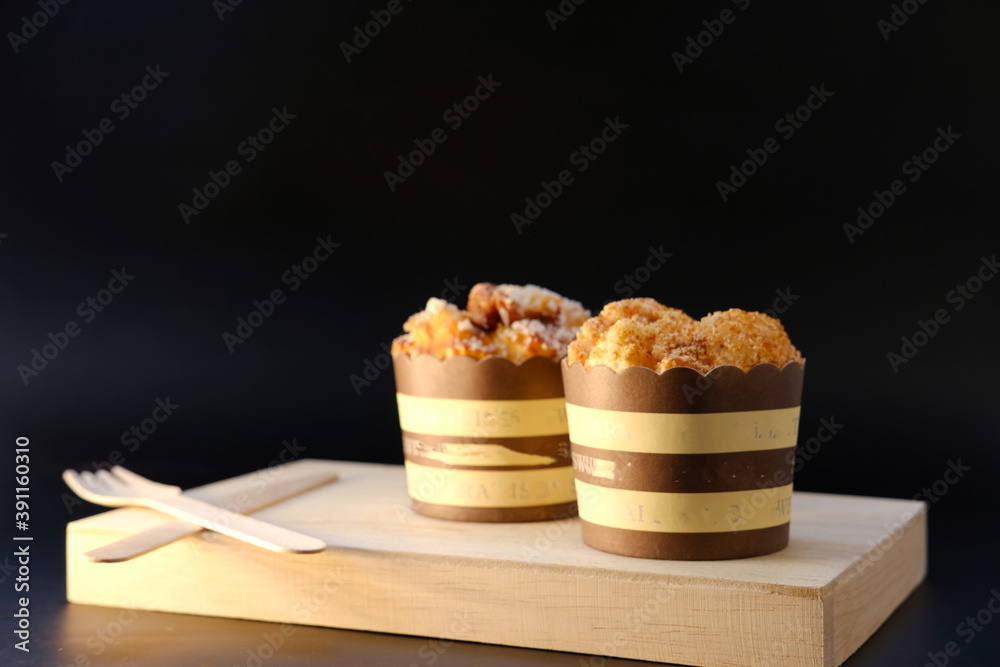 Poster sweet cake on wood table background and space for text