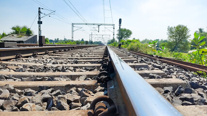 Fototapeta na wymiar railroad tracks in the village side. landscapes click.