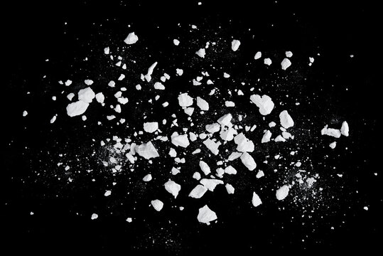 Rock stone broken splash explosion isolated on black background texture object design