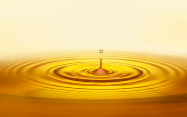 golden oil drop with ripples vegetable, organic, olive, sunflower oil, pure, wellness, and beauty...