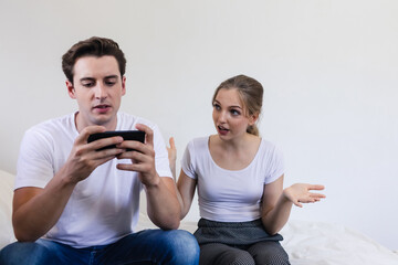 Unhappy & stressed young married couple. Angry offended sullen marriage with depression and...