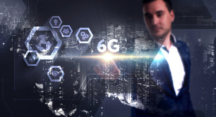 Business, Technology, Internet and network concept. Young businessman working on a virtual screen of the future and sees the inscription: 6G