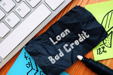 Business concept about Loan Bad Credit with sign on the page.