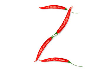 Alphabet letter Z made from red hot chili peppers. Letter isolated on white background.