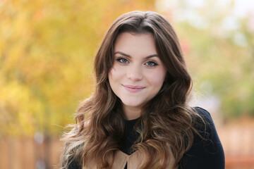 Close up Portrait of 18 Years Old Beautiful, Gorgeous Girl with Long Brown hair and Big eyes, Blurry Fall Background, Happy Teenager 