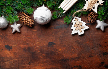 Christmas greeting card with fir tree and decor