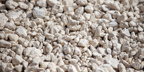 Stone gravel at a construction site as a background.