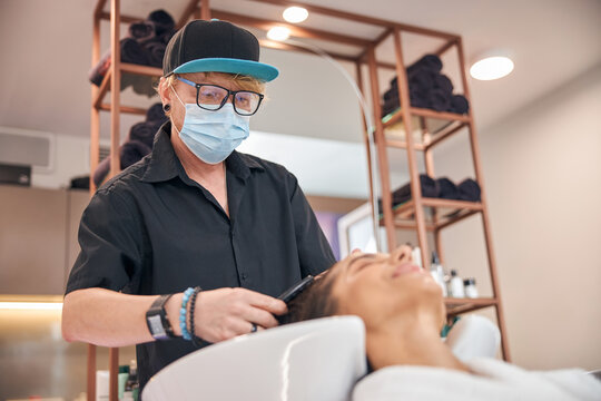 Male person having the mask covering half of the face