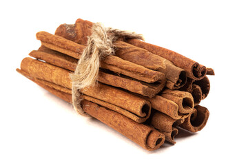 Isolated bandaged bunch of cinnamon sticks