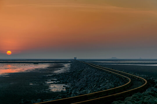 L&uuml;ttmoorsiel-Nordstrandischmoor island railway from Beltringharder Koog to the Hallig of Nordstrandischmoor. A Lore on the way to Nordstandischmoor 