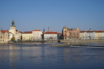 Obraz premium Historic city center and old town of Prague across Vltava River, Czech Republic