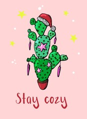 
Postcard for the holidays of Christmas and New Year. Cactus is a Christmas tree. Caption - Stay cozy.