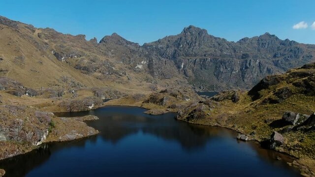 4k aerial drone footage over the  5th lagoon of Pichgacocha from Ambo,  Huanuco, Peru in the Andes mountains. Dolly in  wide angle shot.