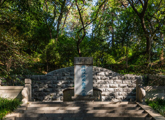 Lu Su's Tomb on Beigu Mountain, Zhenjiang, Jiangsu, China, famous official of Wu state in Three Kingdoms era in 3rd CE. Chinese characters on stele mean Hengjiang (title) General Lu Su's Tomb.
