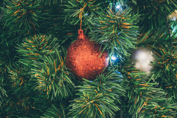 Decorated Christmas tree with red ball New Year holidays background