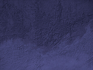 Blue stone background. Rough cement texture. Decorative plaster on a concrete wall.