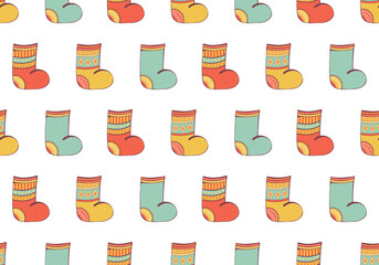 Seamless pattern of christmas socks and felt boots. Background knitted stockings decorated with ornaments. Fashionable items of warm winter clothing. Vector illustration in cartoon style