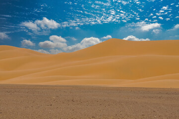 Fototapeta na wymiar Sand dunes in the middle east