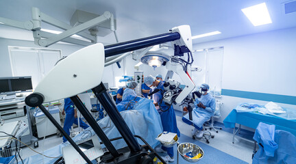 Surgical room in hospital with robotic technology equipment, machine arm neurosurgeon. Closeup of...