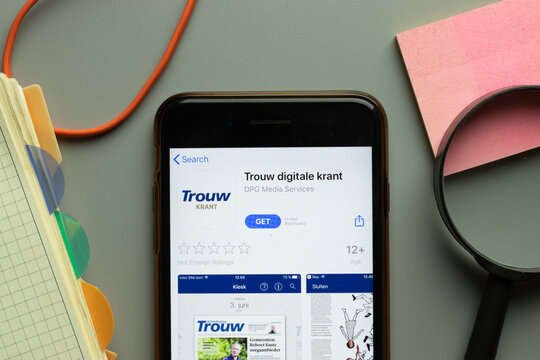 New York, USA - 26 October 2020: Trouw digitale krant mobile app logo on phone screen close up, Illustrative Editorial
