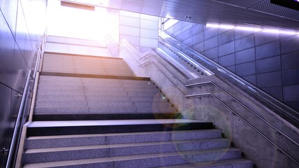 The stairs in the subway, entrance to ground. Staircase in metro station in modern city space.