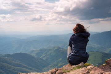 Naklejka premium Beautiful woman smiling in nature. Happy people lifestyle.