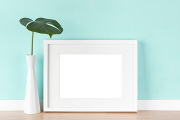 Elegant horizontal picture frame with matte poster artwork mockup, template for online shop with...