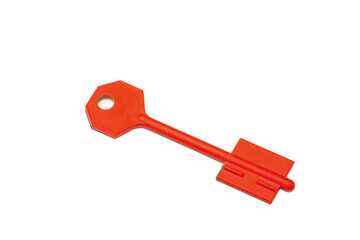 Plastic red key isolated on white background