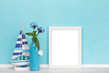 poster artwork online shop mockup template with white wooden vertical picture frame, sailboat and...