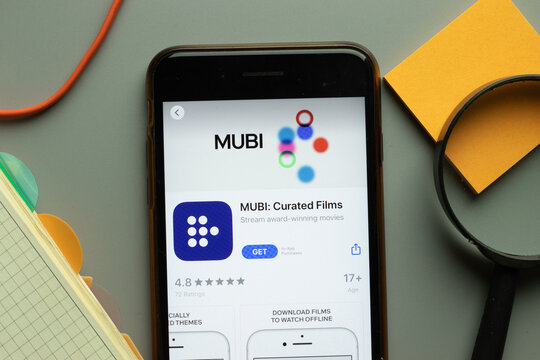 New York, USA - 26 October 2020: MUBI Curated Films mobile app logo on phone screen close up, Illustrative Editorial