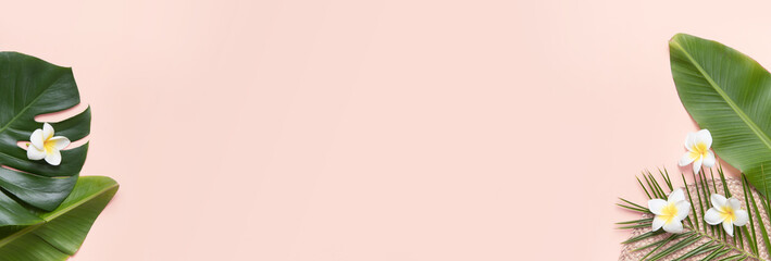 Tropical background with palm leaves and flower.