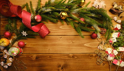 Fototapeta na wymiar Christmas background with wooden decorations and toys. Free space for text. Celebration and decorative design.