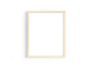 Thin wooden frame with portrait orientation on a light wall