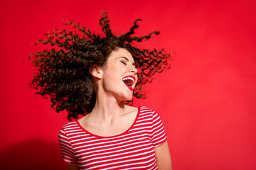 Photo of pretty young girl happy positive smile excited shout enjoy shampoo haircare isolated over...