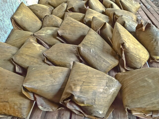 lontong or boiled rice are  traditional food wrapped in banana leaf from central java indonesia