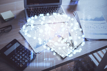 Double exposure of desktop computer and human brain drawing hologram. Ai concept.