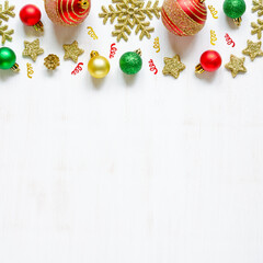 Festive Christmas accessories on white wooden background