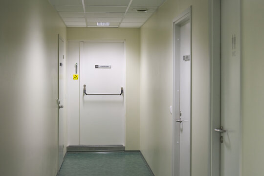 Empty Hallway in a building and fire door