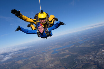 Skydiving. Tandem jump. Flight in the sky.