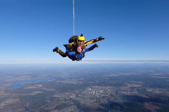Skydiving. Tandem jump. Flight in the sky.