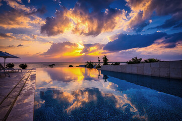 Sunset reflected in a swimming pool on the island of Irabu, Miyakojima, Okinawa, Japan