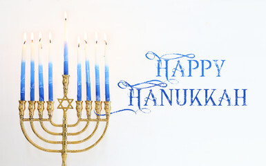 Religion image of jewish holiday Hanukkah background with menorah (traditional candelabra) and candles