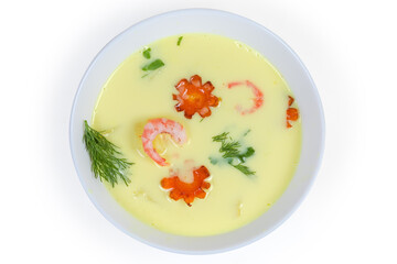 Top view of creamy cheese soup with shrimps in bowl
